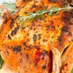Pin of whole Italian Herb Butter Roasted Turkey with title.