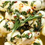 Pin of Marinated Mozzarella Balls up close with title at top