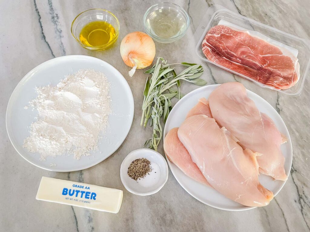 All ingredients needed for Chicken Saltimbocca alla Romana on a counter.