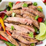 Pin of Chipotle Steak Fajitas in a bowl with title at top