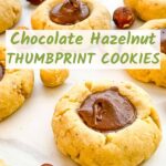 Pin of Chocolate Hazelnut Thumbprint Cookies up close with title.