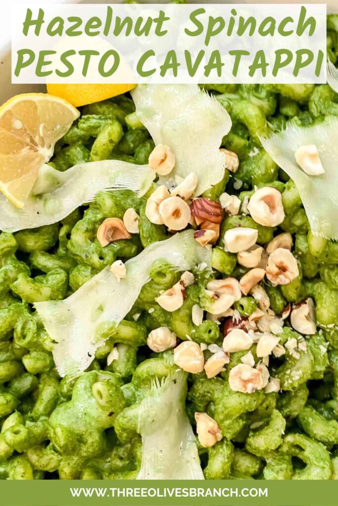 Pin of Hazelnut Spinach Pesto Cavatappi pasta up close with title at top.