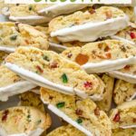 Pin for Panettone Fruitcake Biscotti cookies with title at top.