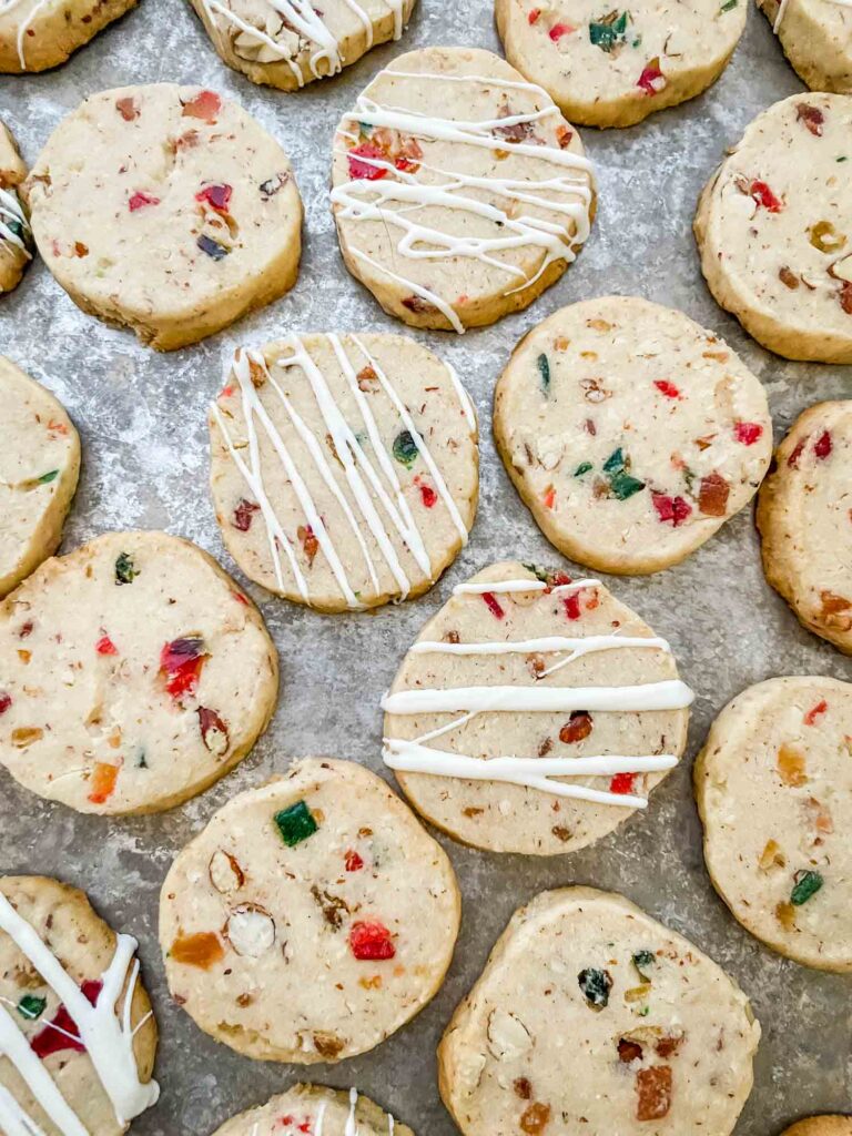 The Panettone Fruitcake Shortbread cookies on a baking sheet.