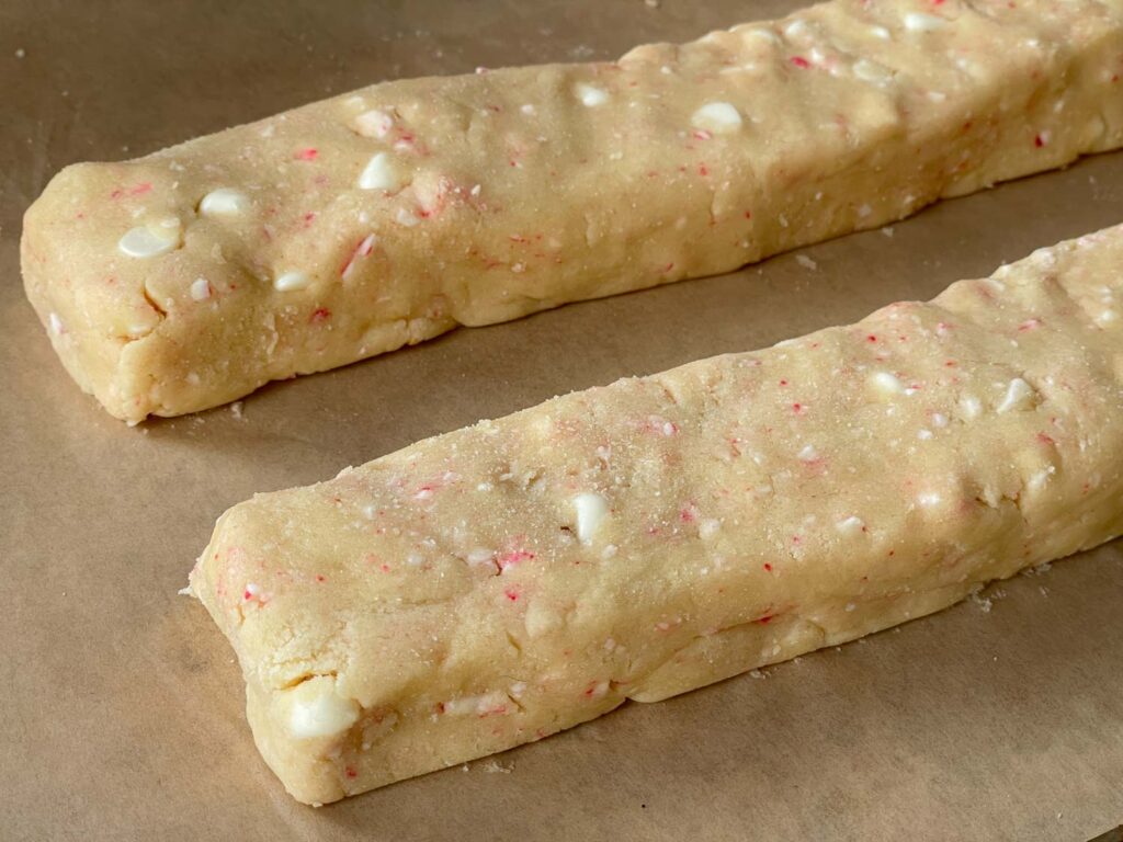 The biscotti dough shaped into two logs.