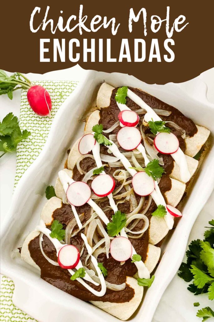 Pin of Chicken Mole Enchiladas in a baking dish with title at top.
