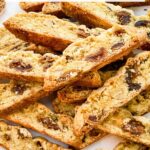 Pin of Fig Walnut Biscotti cookies in a pile with title.