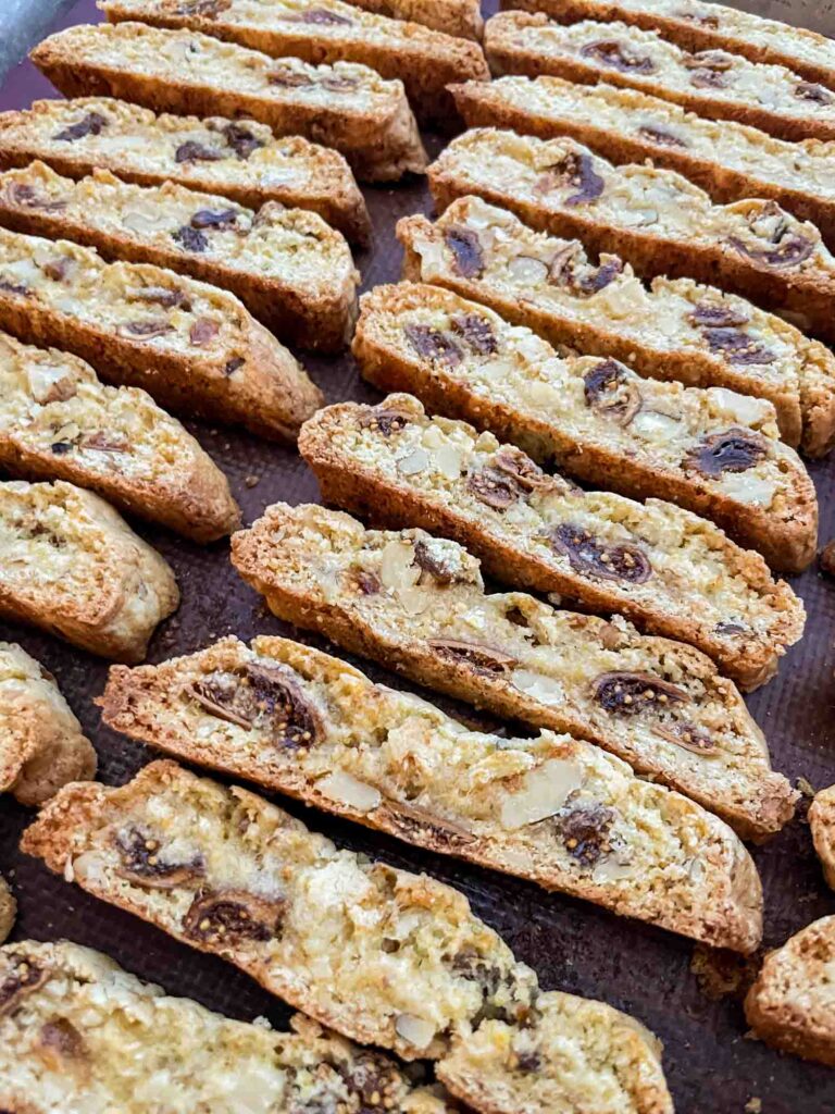 The cookies lined up on a baking sheet.