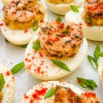 Close view of Cajun Shrimp Deviled Eggs on a plate.