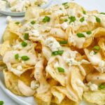 Pin of Copycat Bennigan's Blue Cheese Chips closer up with title.