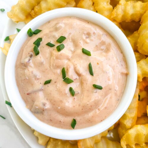 Looking down close up on a bowl of Homemade Chipotle Aioli Sauce.