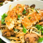 Pin of Copycat Olive Garden Chicken Marsala Fettuccine pasta in a bowl with title at top.