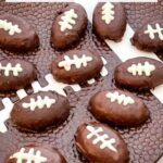 Pin of Football Cake Pop bites with title at top.
