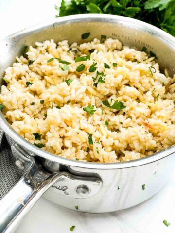 Herbed Rice Pilaf with Orzo in a pot on a counter.