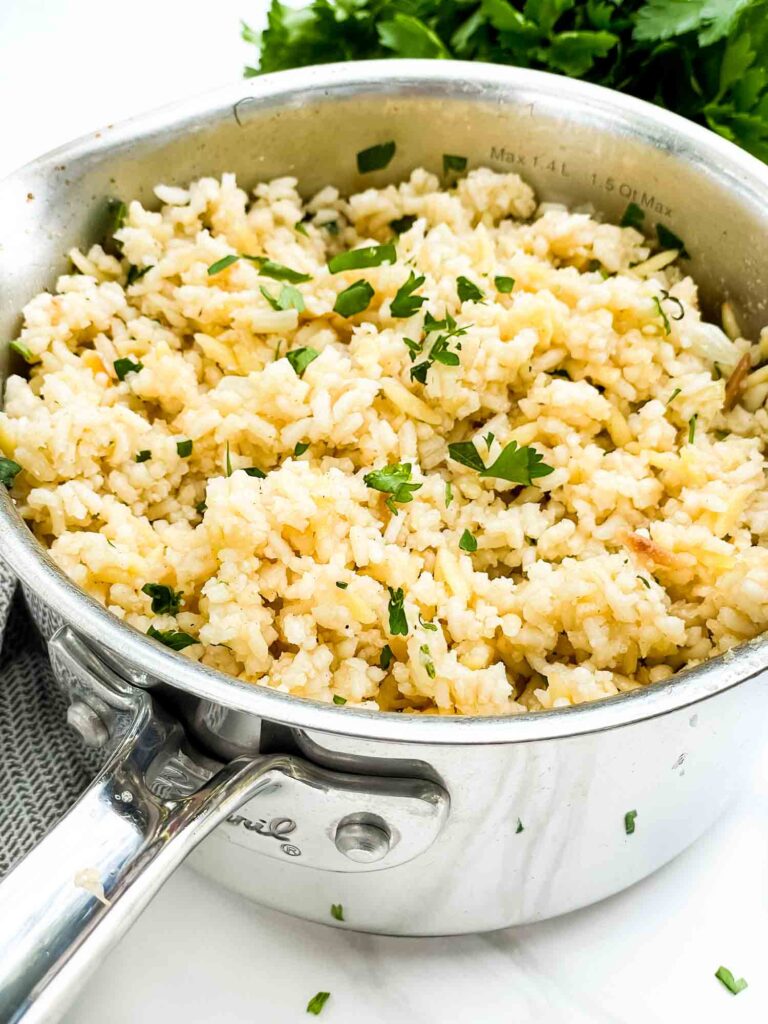 Herbed Rice Pilaf with Orzo in a pot on a counter.