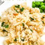 Pin of Herbed Rice Pilaf with Orzo on a plate with title at top.