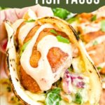 Pin of a Fresh Baja Fish Taco being held with title at top.