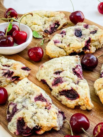 Closer view of Simple Cherry Scones on a wood board.