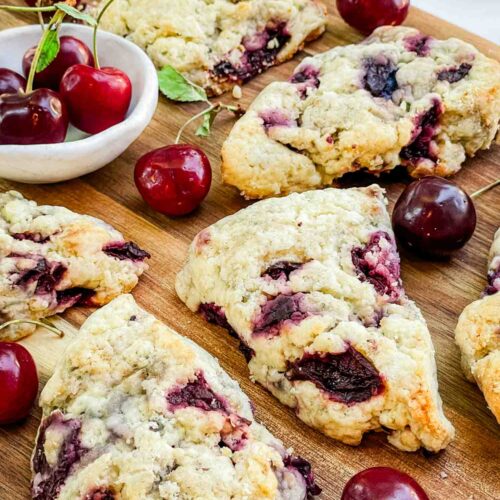 Closer view of Simple Cherry Scones on a wood board.