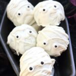 Pin of Halloween Mummy Cake Pops with title at top.