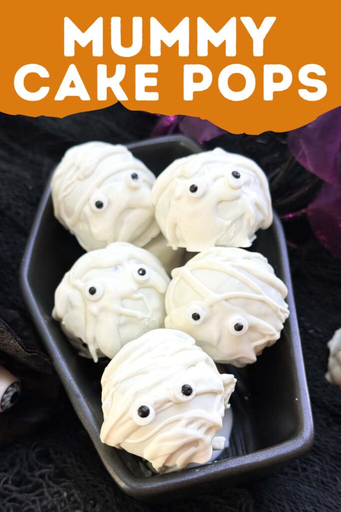 Pin of Mummy Cake Pops for Halloween stacked in a coffin.