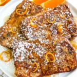 Pin of Panettone French Toast Recipe on a plate with title at top.