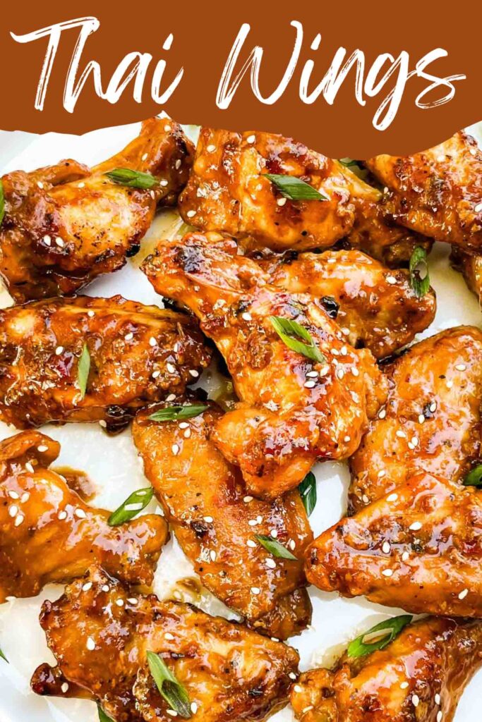 Pin of Thai Chicken Wings up close with title.