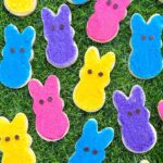 The Peeps Bunny Easter Sugar Cookies laid out across grass.