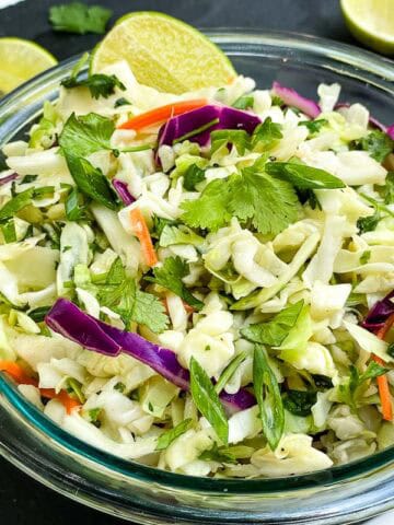 Close up view of Cilantro Lime Coleslaw in a bowl.