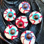 Pin of Halloween Eyeball Cake Pops.