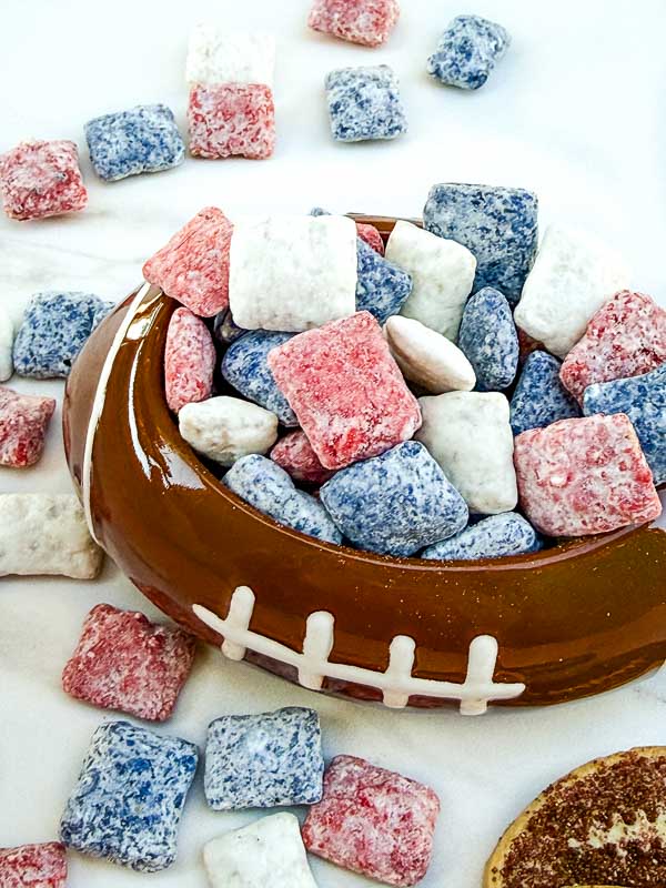 Looking down on Houston Texans Puppy Chow in a football bowl.