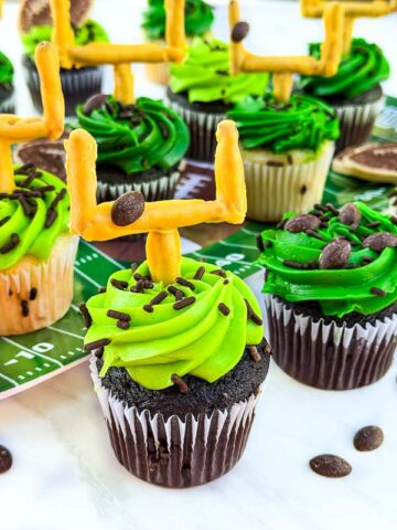 A close view of a Touchdown Cupcake with more behind it.