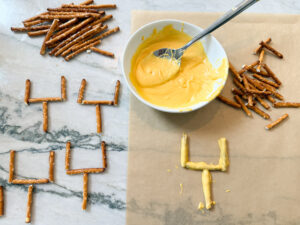 The process of making the pretzel field goals for Touchdown Cupcakes.