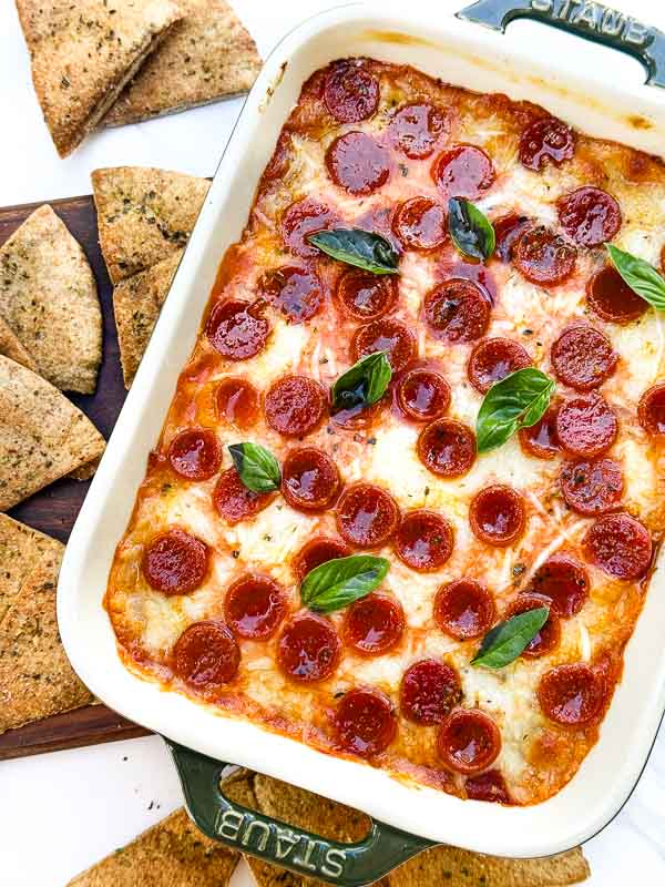 A closer view looking down on Pepperoni Pizza Dip in a small dish.